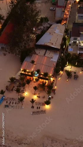Popular tourist coastline at dusk, city lights