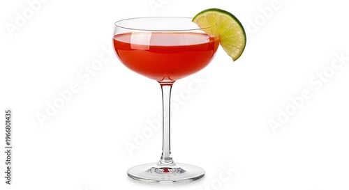 Elegant red cocktail with lime garnish in martini glass on white background