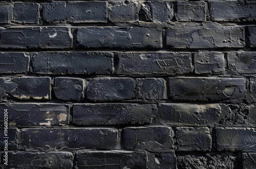 Photo of Old brick wall painted in black color. Background texture for backdrops or mapping