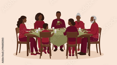 Multi-generational Black family having dinner around a dining table