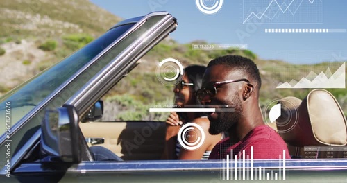 Driver speaking while camera shifting adding HUD overlays showing travel data as passenger smiles