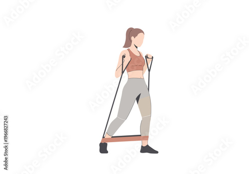 Woman exercising with resistance band in fitness studio setting regularly