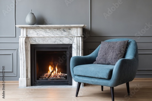 Teal armchair and fireplace create a cozy, elegant living room scene.