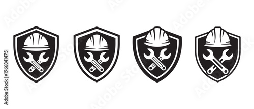 Construction Hard Hat and Wrenches Logo in Shield, Black & White Vector Icon for Safety and Repair.