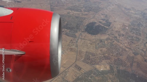 City Overview View. Aerial Perspective Capturing City Streets And Rooftops During Daytime