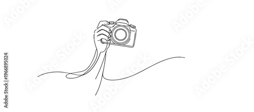 single line hand holding camera.continuous line drawing of photographer holding digital camera.photography concept.one line vector illustration.