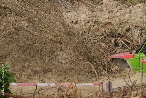 Red Pickup off road  4WD spin mud dirty track on mountain hill.     