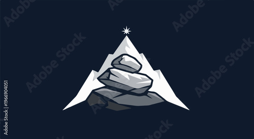 Stacked stones on a mountain peak with a star