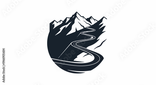 Winding mountain road through dark, jagged peaks