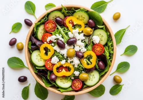 Colorful and fresh mediterranean salad in a wooden bowl