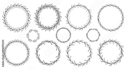 Elegant collection of eight black and white hand-drawn circular floral wreaths made of delicate leaves and branches for decorative frames.