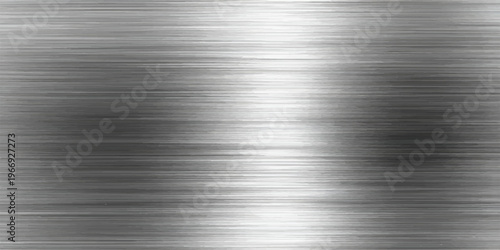 A polished silver stainless steel plate featuring a brushed metal texture and shiny metallic surface creates an industrial grey aluminum background with a sleek light reflection pattern