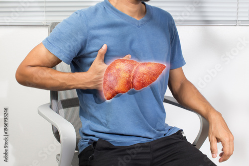 Male holding abdomen with highlighted liver illustrating cirrhosis hepatitis inflammation and related complications in healthcare concept