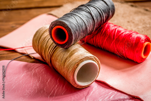 Tableau sur toile leather craft instruments on wooden background close up
