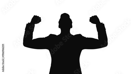 Dark shadow of a person wearing a suit jacket showing muscular arms raised in a gesture of pure strength.