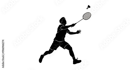 Silhouette of a badminton player hitting shuttlecock during game.