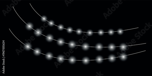 Abstract black and white image of string lights with bokeh effect
