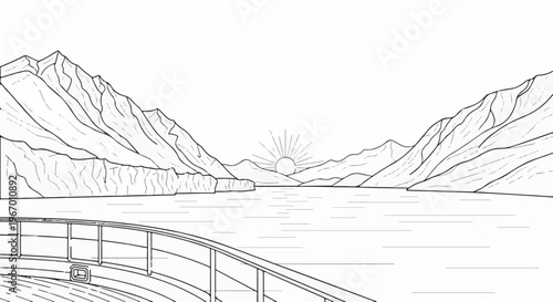 Majestic mountain range bordering a serene lake with the sun rising