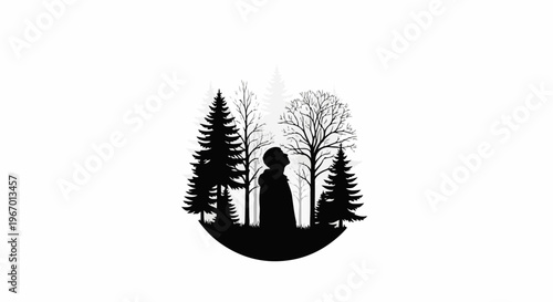 Silhouette of a person looking up at trees in a forest