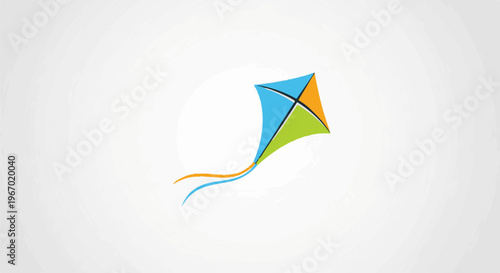 A colorful kite with a flowing tail against a bright white background