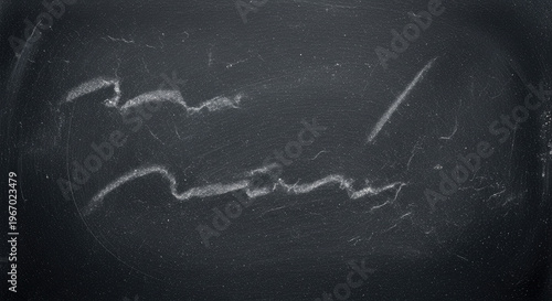 Dark background with white scratch marks.