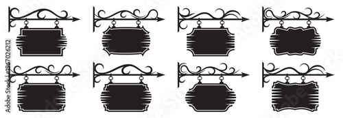 Vintage hanging signboard set. Decorative wrought iron brackets with blank boards for shop signage and retro street design elements