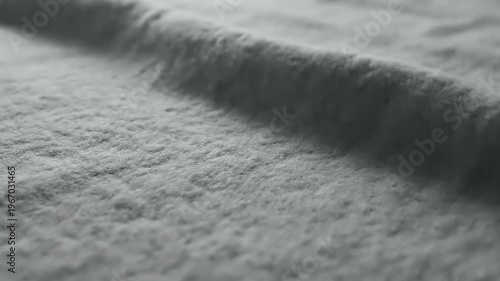 Close-up of gray fabric texture.