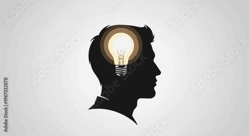 Silhouette of a human head with a glowing light bulb as a brain