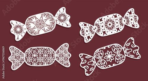Set of decorative candy illustrations with intricate lacy and floral patterns isolated on a dark burgundy background.