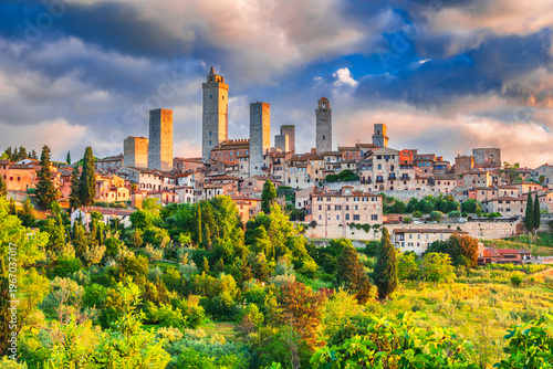 Bild auf Leinwand San Gimignano medieval town skyline and famous towers during sunrise - Tuscany, Italy