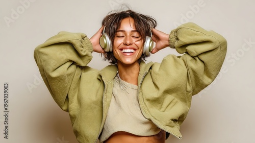Harmony of Sound: A woman embraces the world of music, her face illuminated with pure joy as she wears a set of headphones, eyes closed, lost in the melodic rhythm and serene.