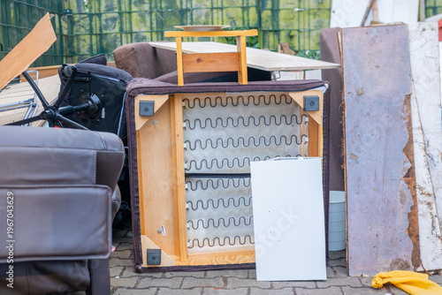 Konstfotografi bulky waste reduction, large pile discarded furniture and wooden panels, renovat