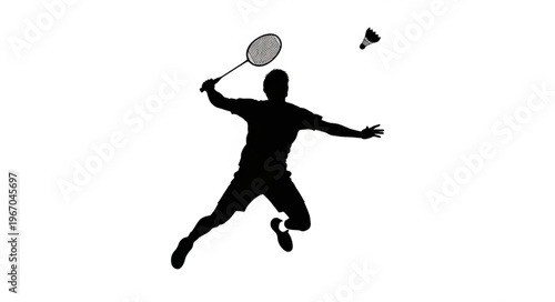 Silhouette of a Badminton Player in Action.