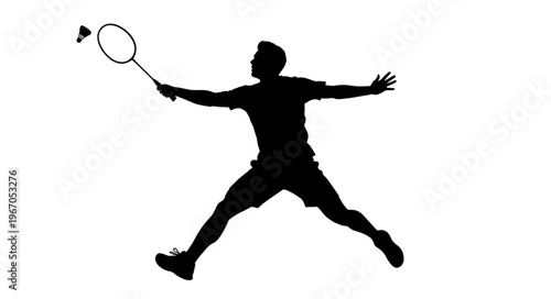 Silhouette of a Badminton Player in Action.