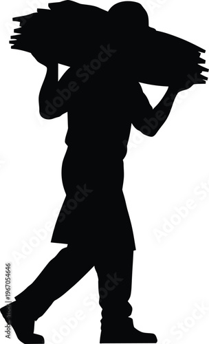 Silhouette of a factory worker carrying heavy load industrial labor concept
