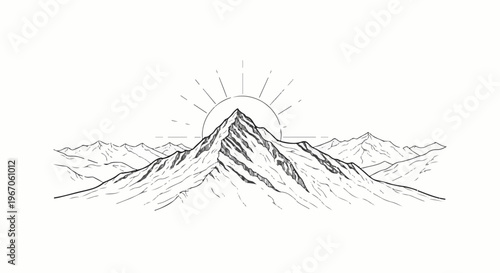 Majestic snow-capped mountain range with sunburst rising behind peak