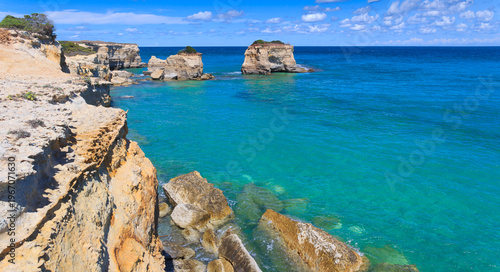 Obraz na płótnie Typical Salento coast near town of Otranto in Apulia region, southern Italy: view of the Sea stacks de' la Castddhruzza
