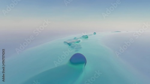 Water droplets fall on a serene ocean surface creating ripples