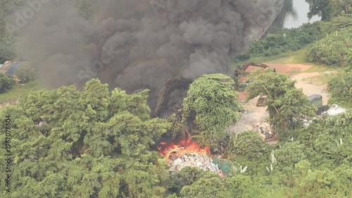 Big fire on a dump in the middle of the city in Kuala Lumpur Malaysia