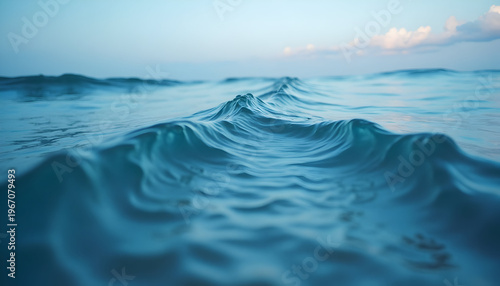 Calm Blue Ocean Waves Surface Under Clear Sky
