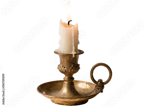 Fotografía Burning candle in an ornate antique brass candlestick with dripping melting wax,