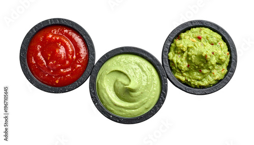 Three textured dips in dark bowls, vibrant colors, overhead view