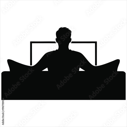 A man sitting on a couch in a minimalist living room