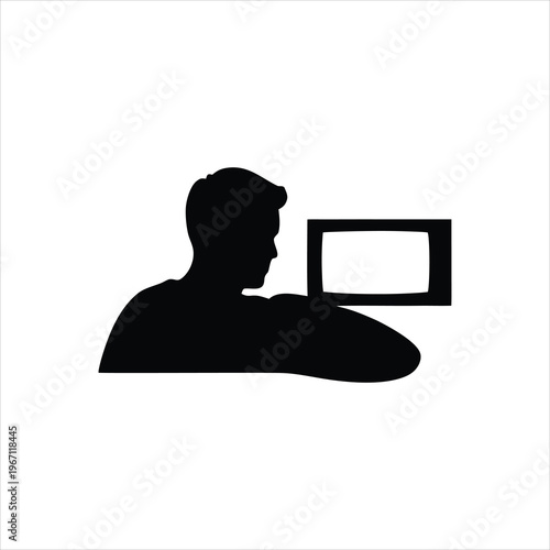 A silhouette of a man holding a blank sign