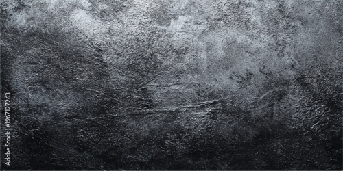 A dark gray and black and white texture featuring a grunge concrete wall pattern with an old aged surface and a rough vintage paper backdrop design