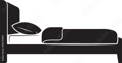 Black and white of a bed with a pillow and blanket