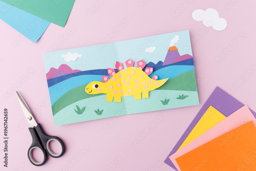 Obraz premium childhood leisure home activities cute dinosaur craft work toddler development motor skills parent child bonding time scrapbooking stationery supply creative workshop hobbyist diy masterclass