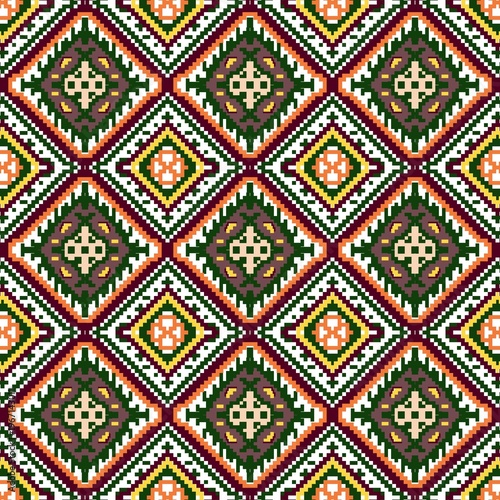 Seamless Ethnic Pixel Pattern with Earthy Green and Orange Geometric Embroidery Style