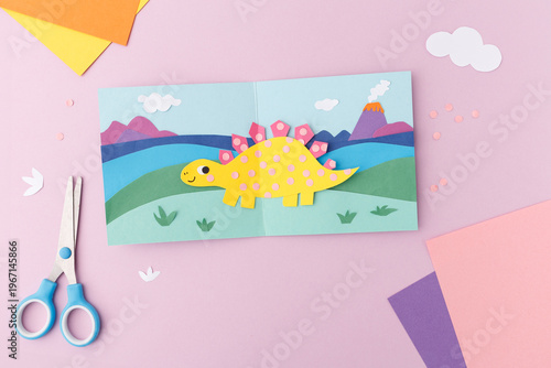 Dinosaur paper art craft for children family leisure activity creative development tools kids entertainment stegosaurus project parenting blog imagery childhood hobby handmade card