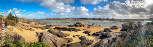 Beach and tidal pools near in Tregastel, Brittany, France. Panoramic view